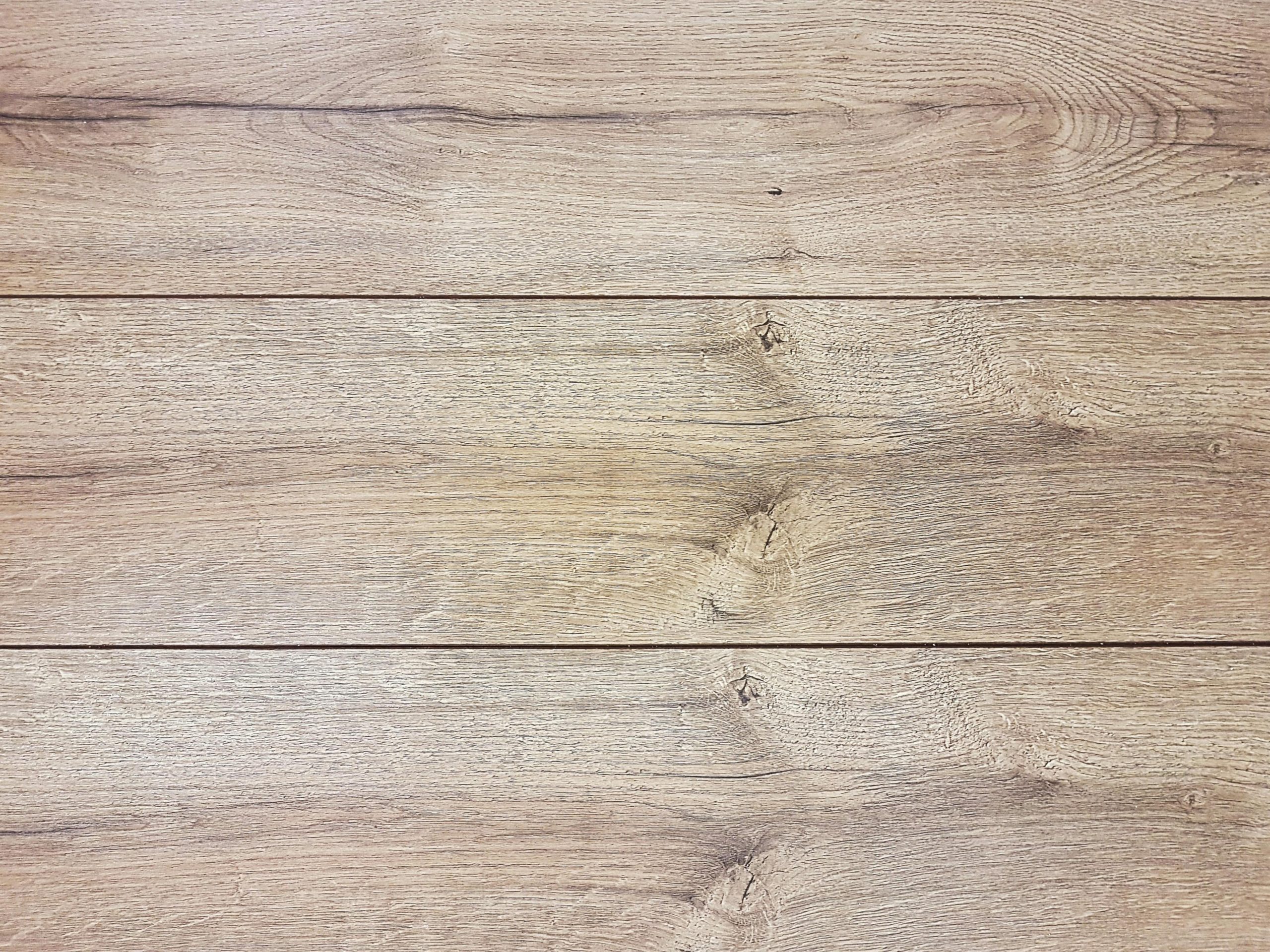 High-resolution image of a rustic wooden plank texture, ideal for backgrounds and design projects.